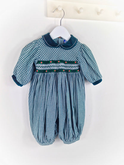 6-9 months. Green smocked romper by Carriage Boutique