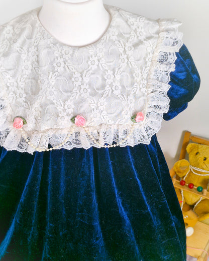 5-6 years. Navy velour vintage dress from Nutcracker with white lace bib, pink rosettes and pearl details