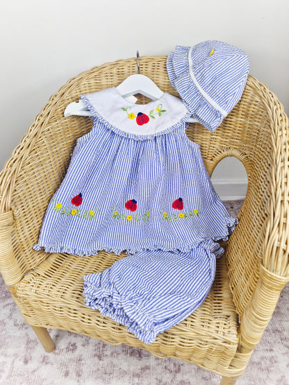 12-18 months. Three piece vintage Itty Bitty set, dress, bloomers and hat with embroidered flowers and ladybugs.