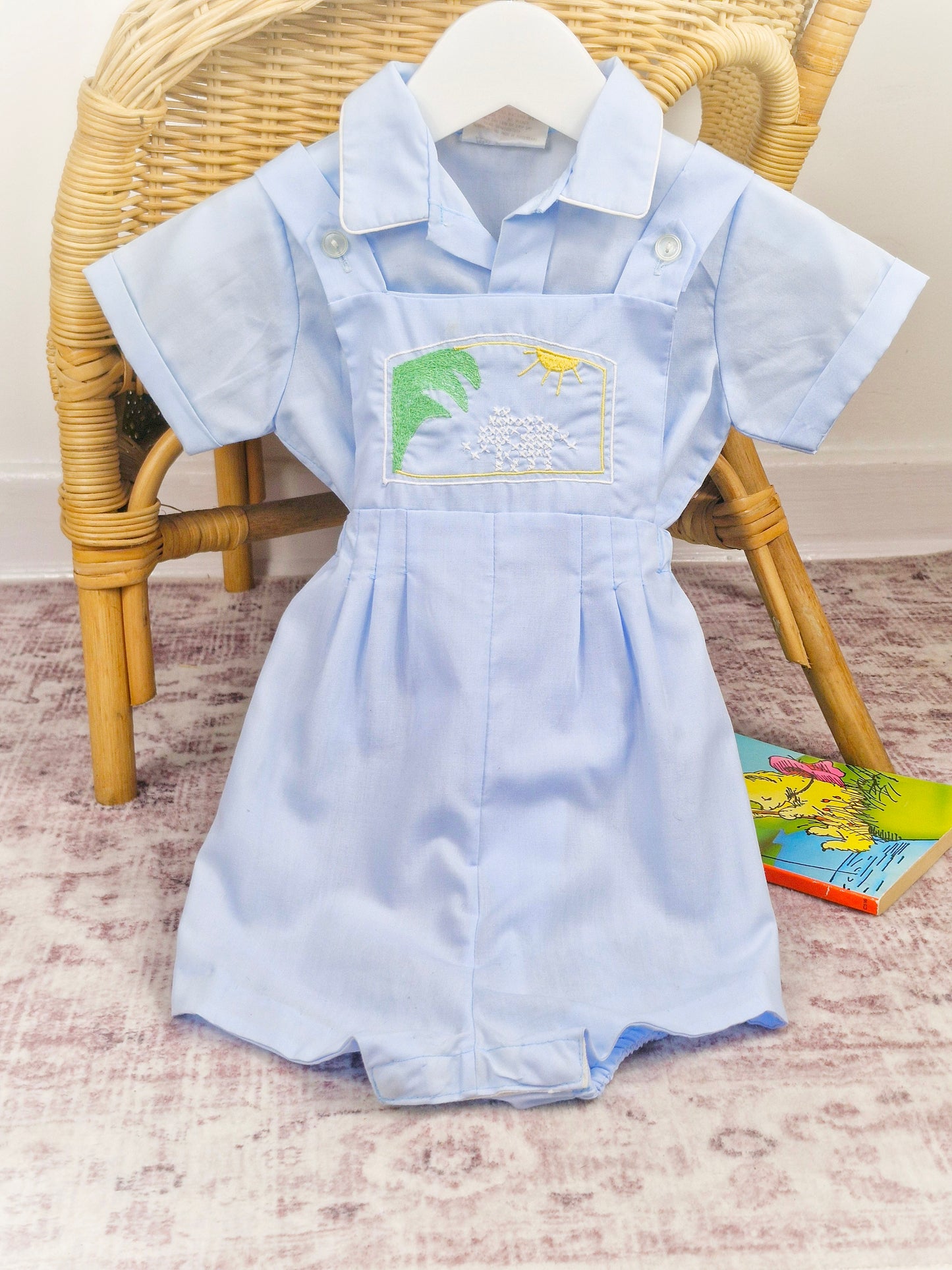 12-18 months. Blue two piece vintage set, shirt and dungarees embroidered design across chest