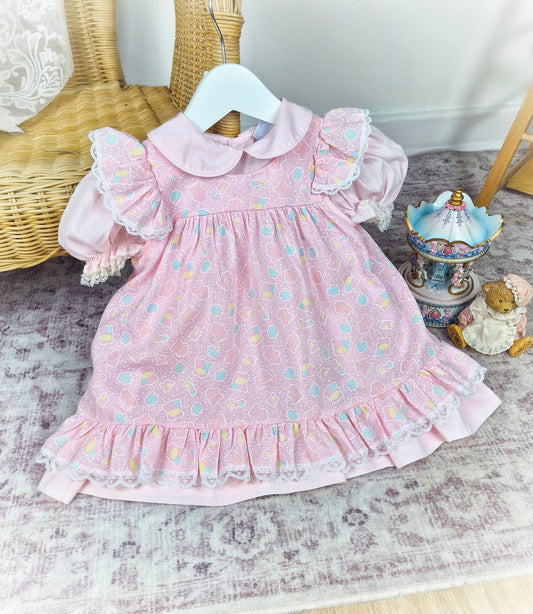 12-18 months. Mix & match two piece set, vintage Bryan dress and pinny with fun print and flutter shoulders