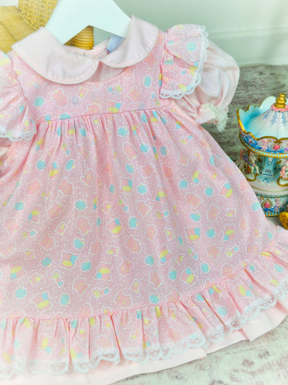 12-18 months. Mix & match two piece set, vintage Bryan dress and pinny with fun print and flutter shoulders