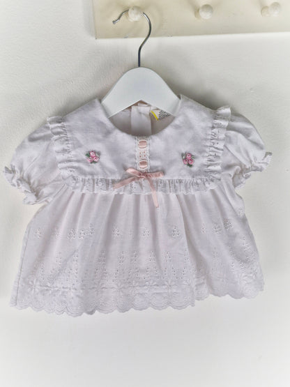 0-6 months. White vintage broderie anglais dress with pink satin ribbon