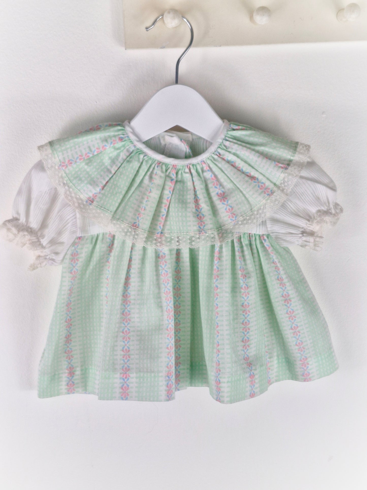 3-6 months. Mint and white gingham vintage dress with frilly collar and floral designs