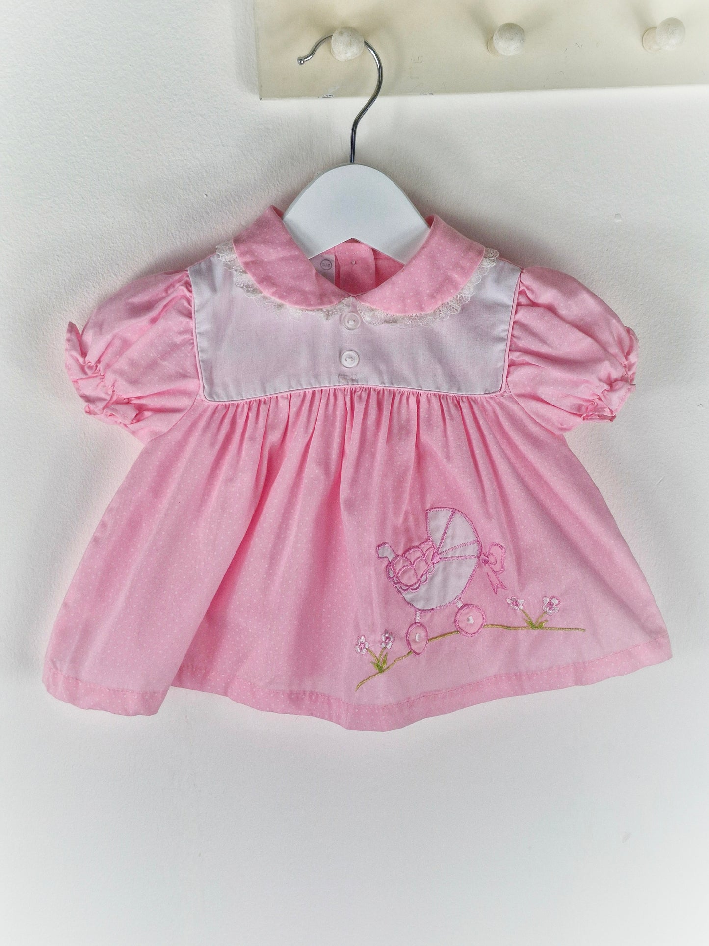 3-6 months. Pink vintage dress with embroidered pram, bow and flowers