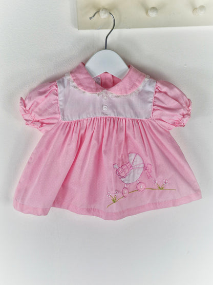 3-6 months. Pink vintage dress with embroidered pram, bow and flowers