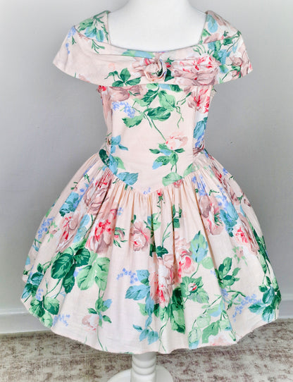 5 years. Pink vintage dress from Eve, too! With floral print and pretty of the shoulder style
