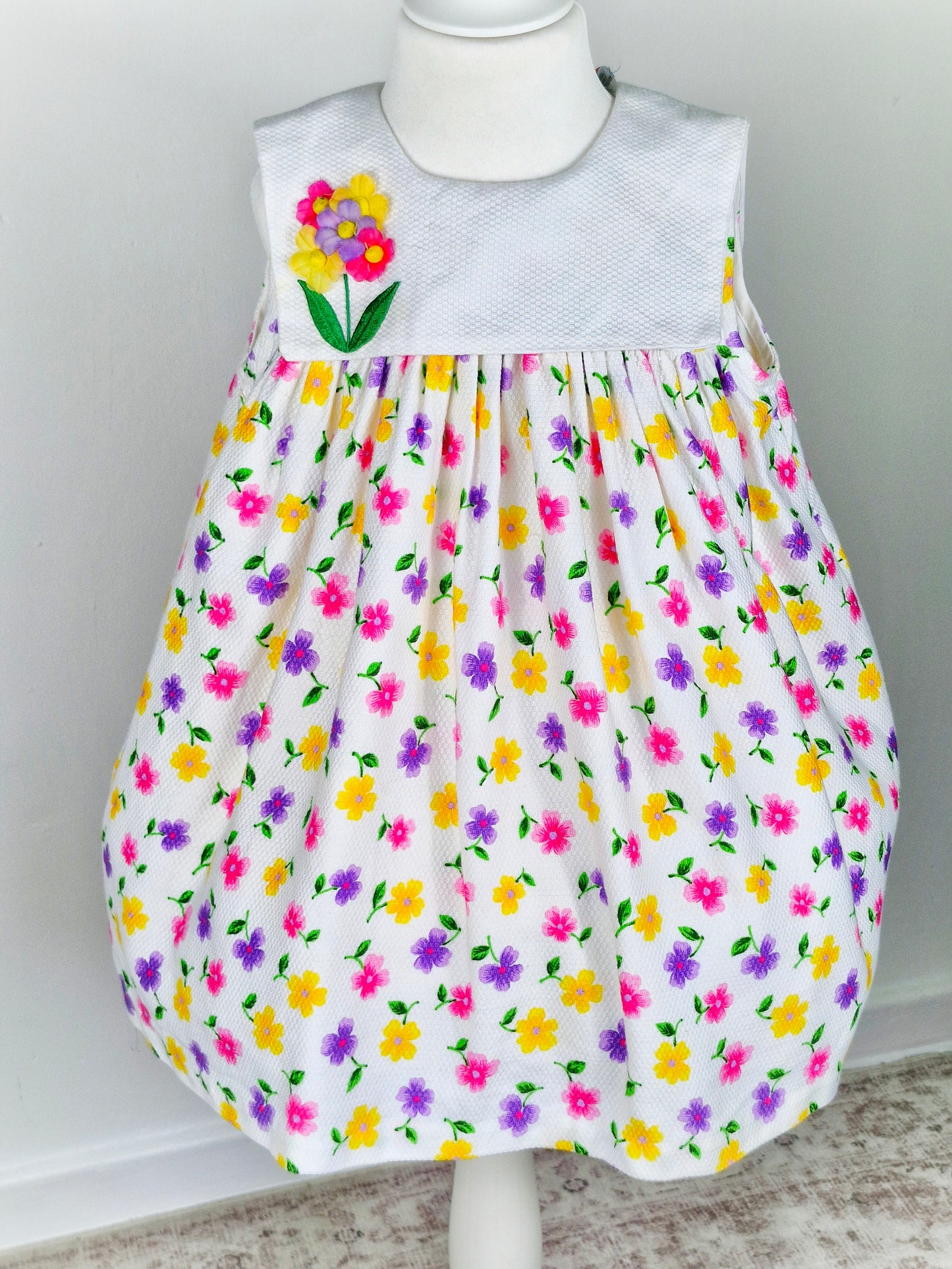 3-4 years. White sleeveless vintage Good Lad of Philadelphia dress with bright floral design