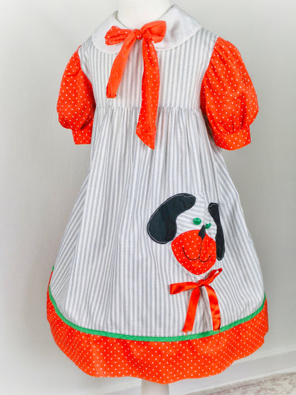 5 years. White vintage Fayette with grey stripes, red polka dot sleeves and details