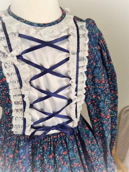 7-8 years. Navy floral vintage dress by Carolyn's Collection with satin ribbon and lace