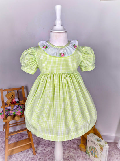 2-3 years. Lime green checked vintage dress with white collar, pink rosettes and puff sleeves