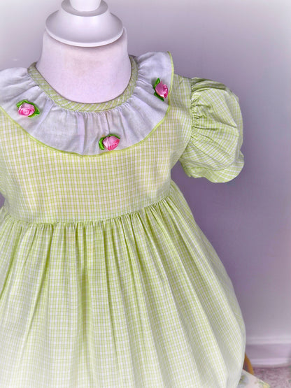 2-3 years. Lime green checked vintage dress with white collar, pink rosettes and puff sleeves