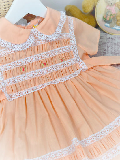 18-24 months. Peach vintage smock Michael de Leon dress with white lace and dainty embroidered flowers