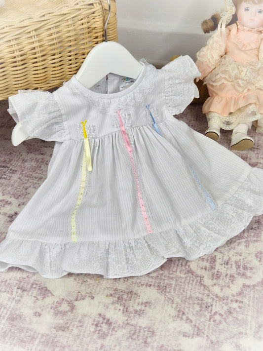 0-6 months. Vintage Mayfair dress, white with butterflies and pastel satin ribbons