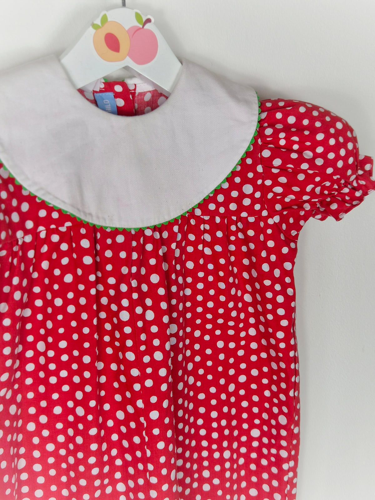 2 years. Red and white polka dot vintage romper with white bib from Mondays Child