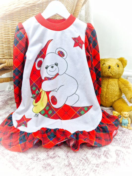 2 years. White Nightie with red tartan sleeves, hem and teddy bear. Slight stain*