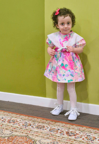 2-3 years. Vintage Roanna dress with vibrant pink print and white lace trimmed collar