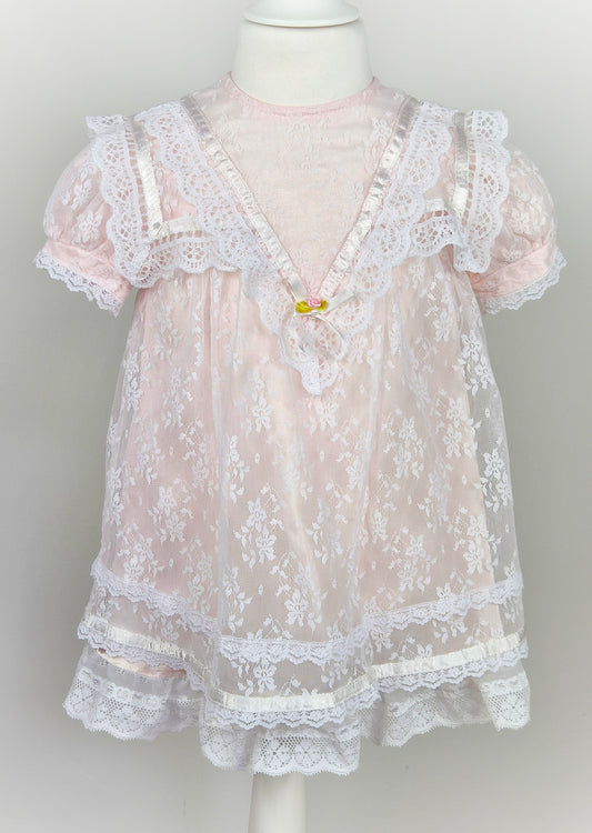 3 years. Pale pink vintage Jessica McClintock dress with white lace overlay, puff sleeves, pink satin ribbon trim and rosette