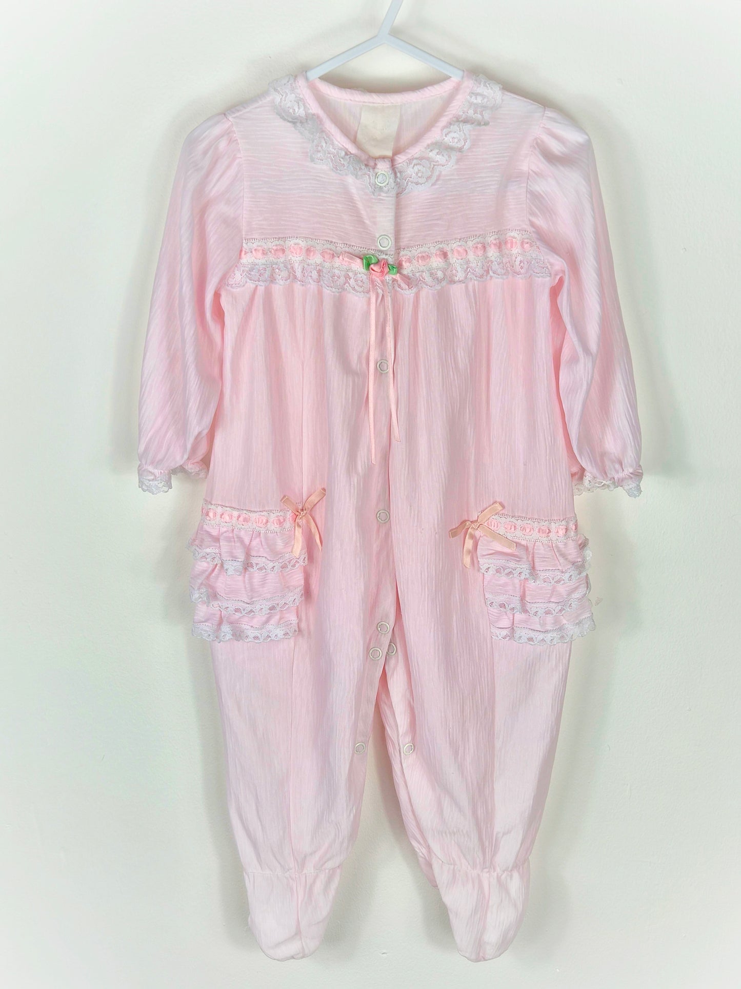12 months. Pink vintage sleepsuit sith lace, ribbons and frills
