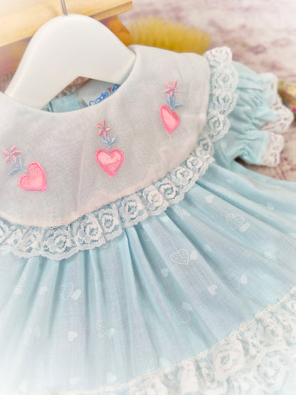 12 months. Mint vintage dress with white bib, pink embroidered hearts and lace trim
