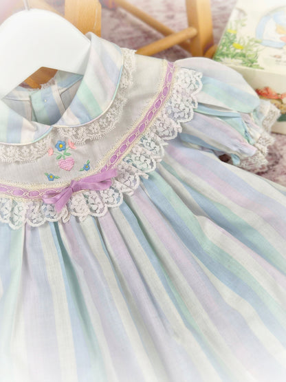 9-12 months. Pastel striped vintage dress with lace details and embroidered design