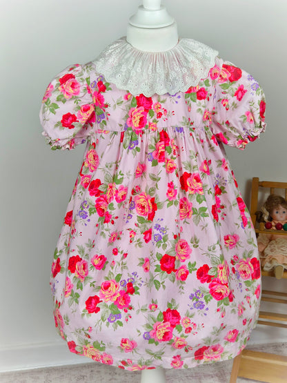 4 years. Pink floral vintage dress with white eyelet collar and puff sleeves