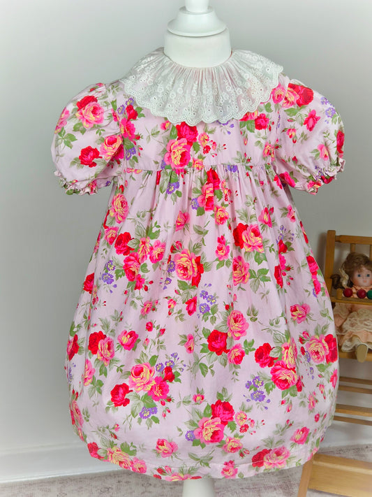 4 years. Pink floral vintage dress with white eyelet collar and puff sleeves