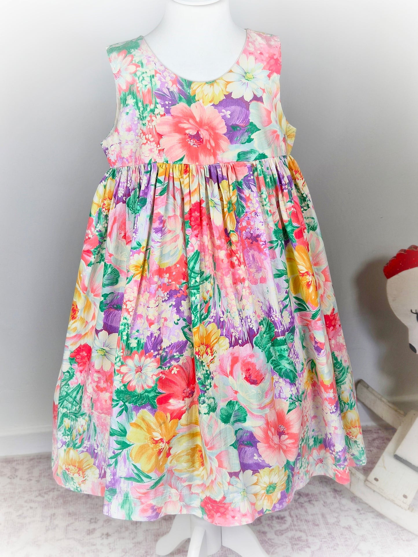 7-8 years. Sleeveless floral dress, handmade from vintage fabric