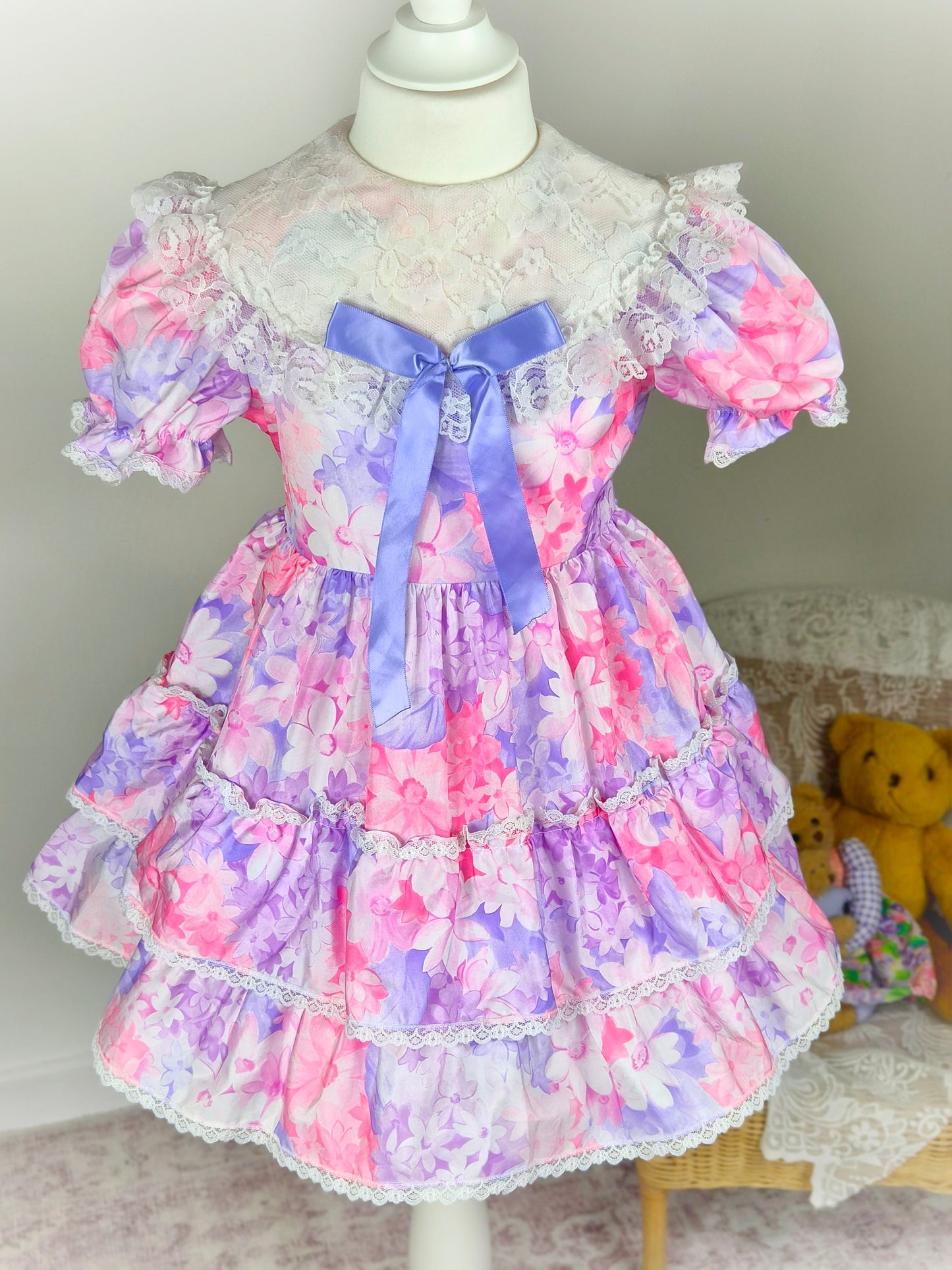 4-5 years. Pink and purple floral vintage dress from Martha's Too with white lace bib and purple satin ribbon bow