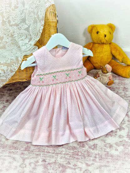 12 months. Pink sleeveless vintage smock dress with embroidered cherries