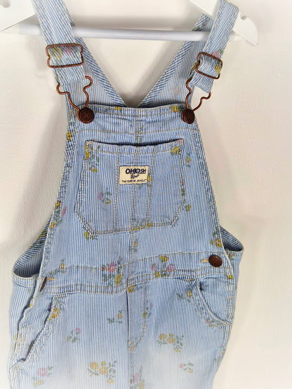 4 years. Blue and white striped Oshkosh dungarees with floral print