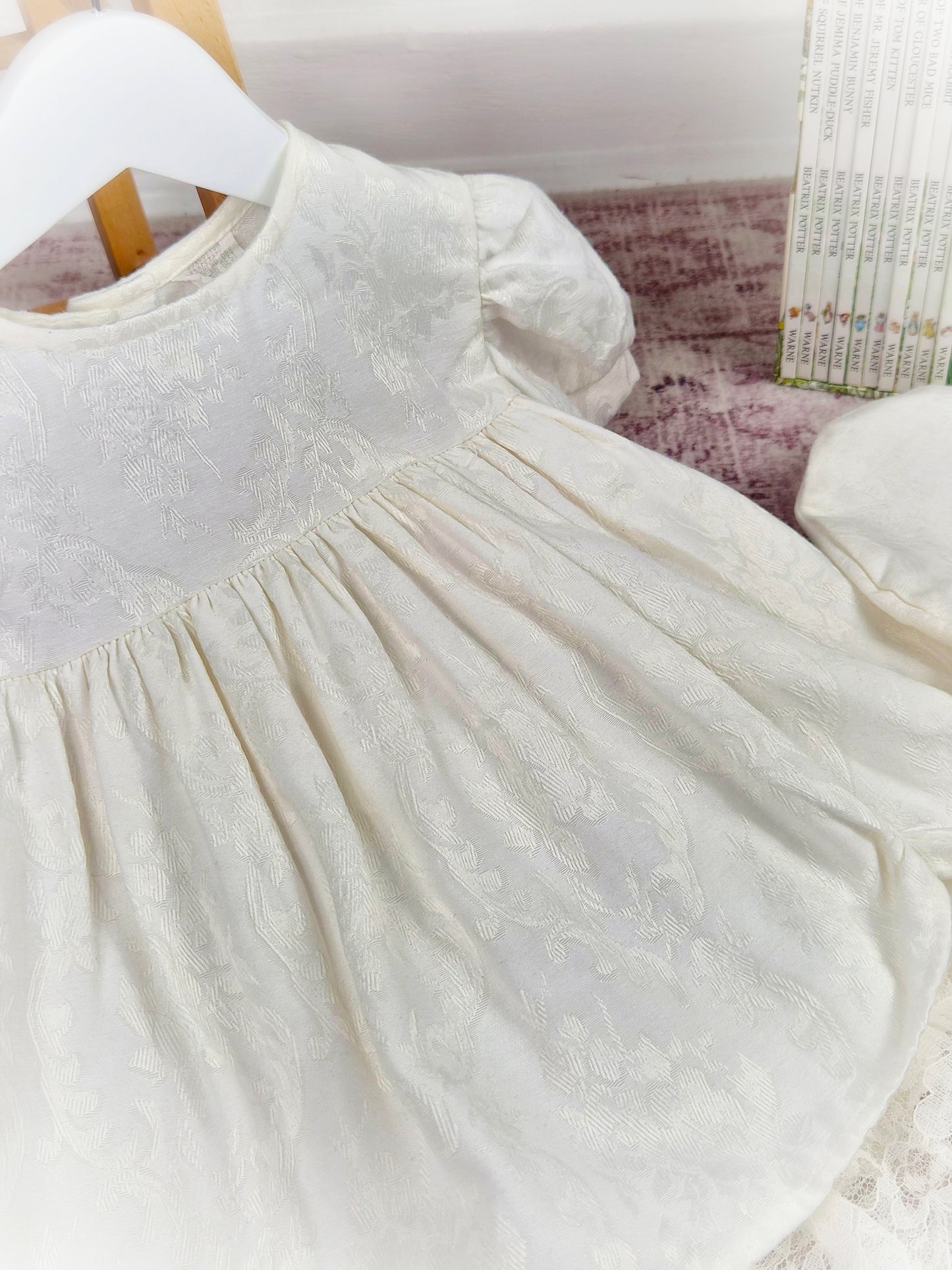 12-18 months. Cream vintage dress with puff sleeves, lace hem and matching hat