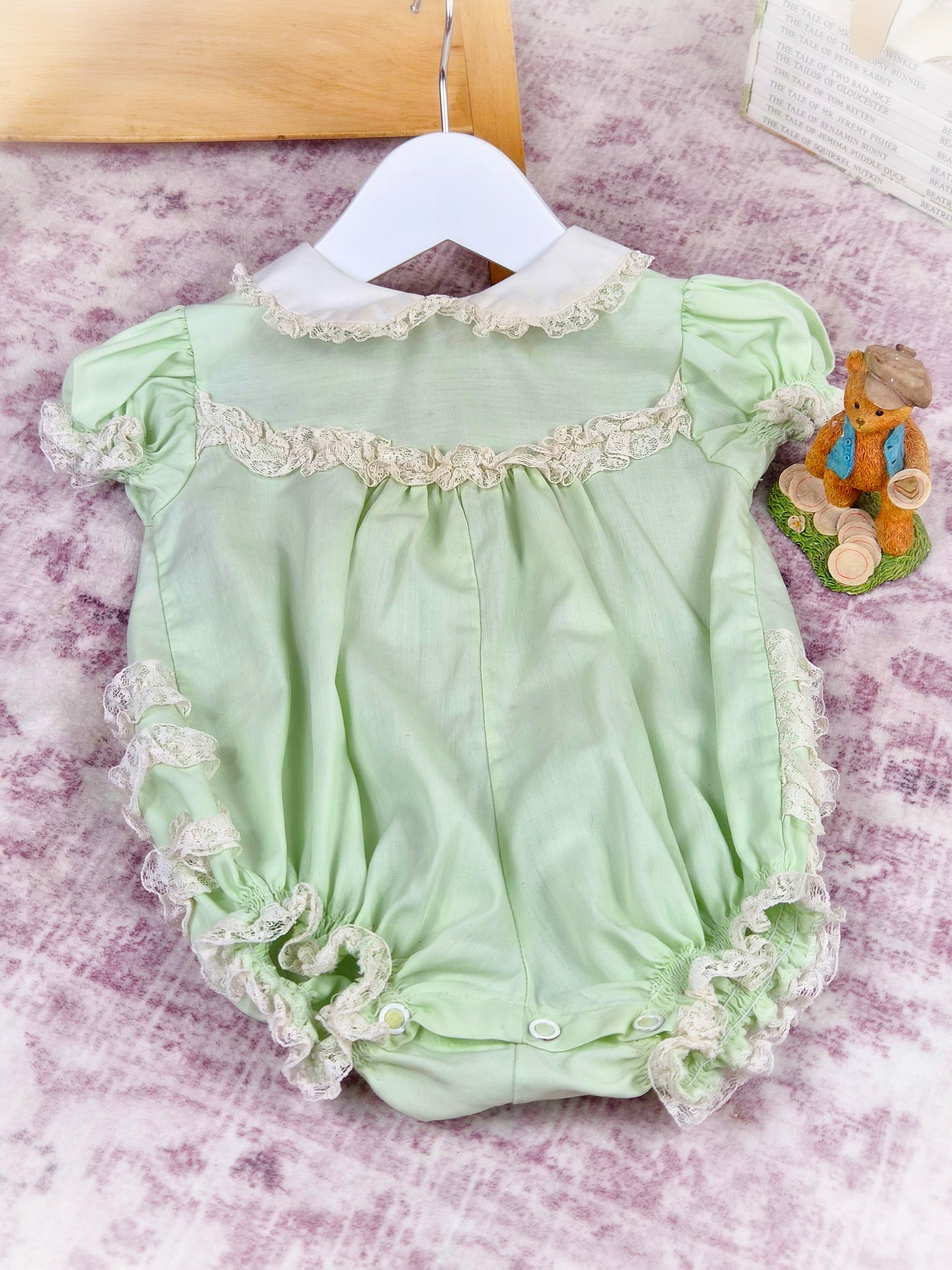 6-12 months. Mint vintage short romper from Bryan with white collar and lace details