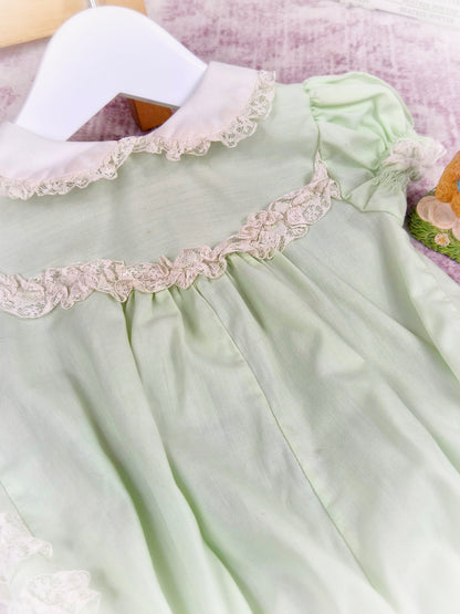 6-12 months. Mint vintage short romper from Bryan with white collar and lace details
