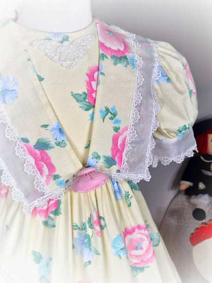 4-5 years. Lemon vintage dress by Atlanta with pink and blue floral print and white lace details