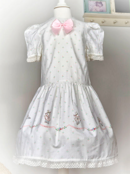 6 years. White vintage Daisy Kingdon dress with pink satin bow and bunnies