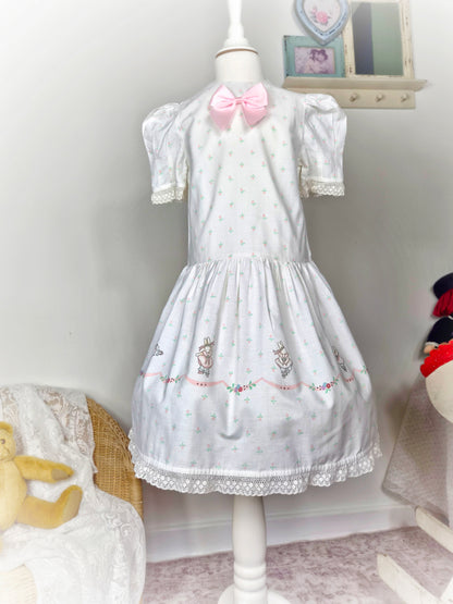 6 years. White vintage Daisy Kingdon dress with pink satin bow and bunnies
