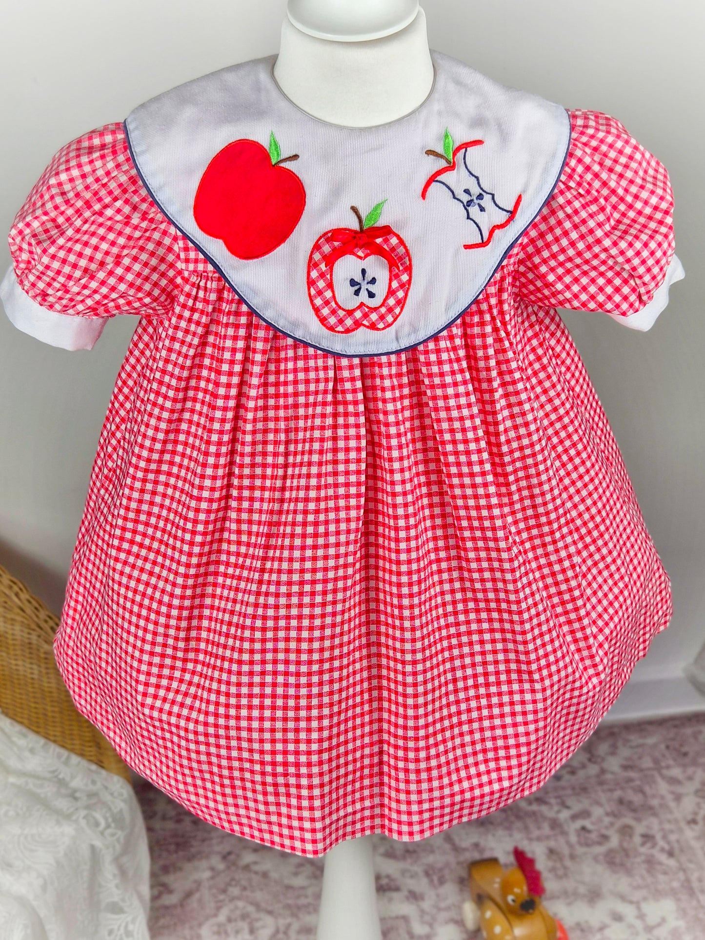 3 years. Red and white gingham vintage dress by Allison Ann with puff sleeves and white bib and apple appliques