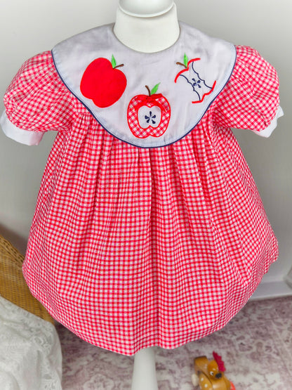 3 years. Red and white gingham vintage dress by Allison Ann with puff sleeves and white bib and apple appliques