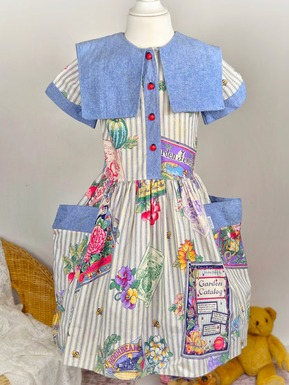 6 years. Vintage dress with fruit and floral print, denim collar and pockets and cute ladybug buttons