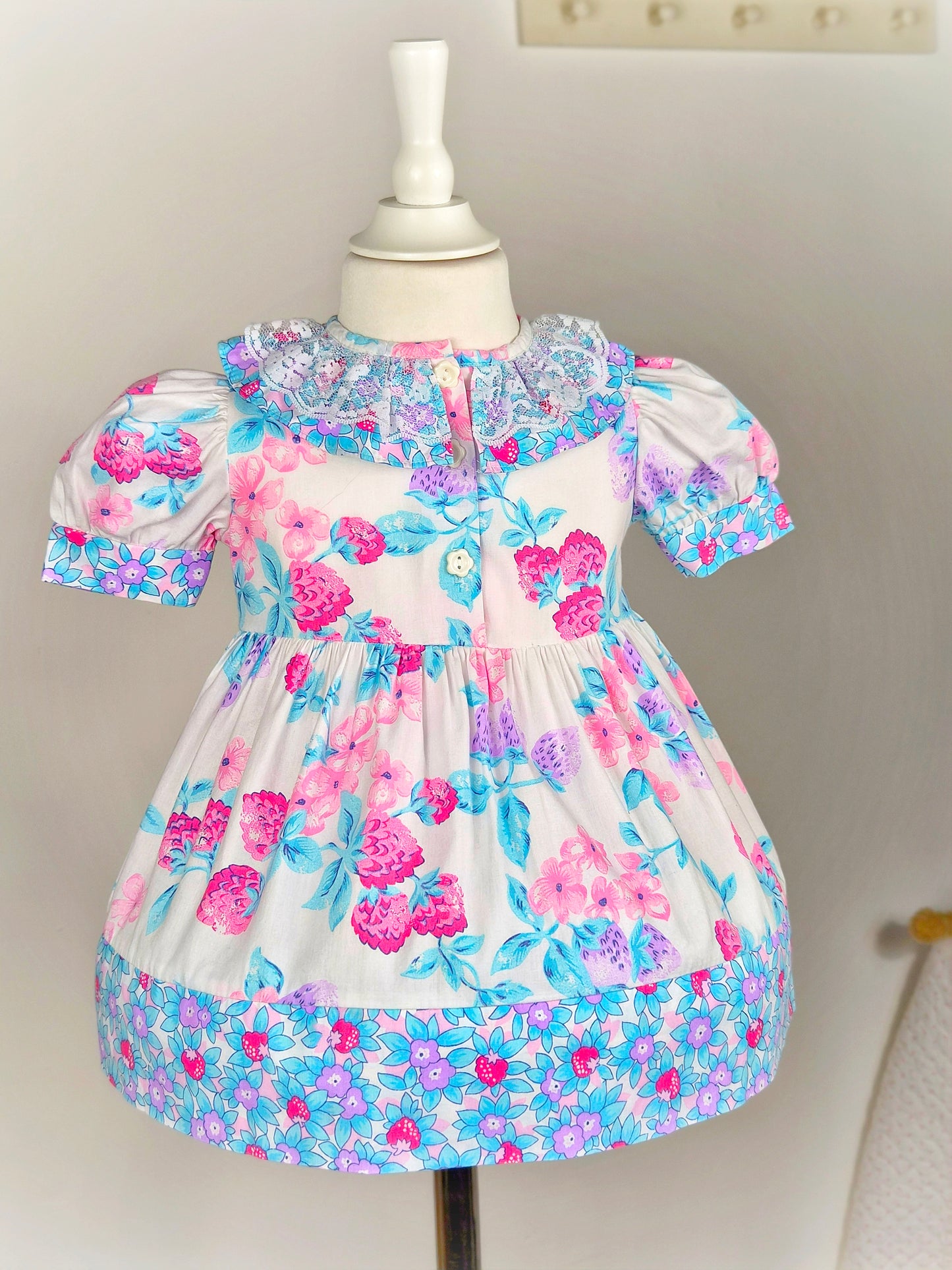 2 years. Vintage dress from Picture Perfect with fruit print, puff sleeves and lace collar