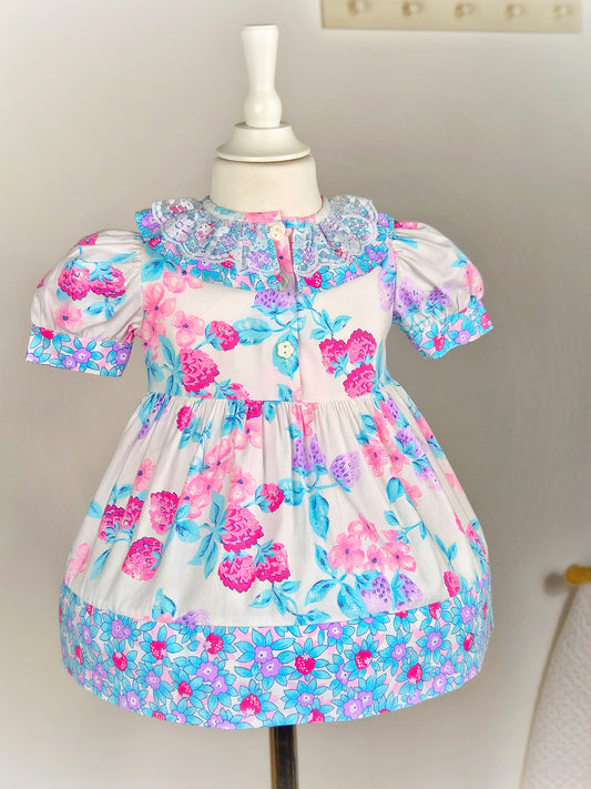 2 years. Vintage dress from Picture Perfect with fruit print, puff sleeves and lace collar