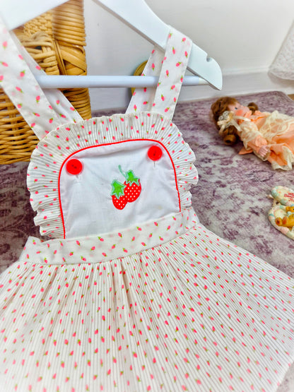18 months. White vintage skirted romper with mini pleats and strawberry print