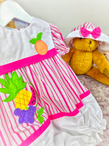 2 years. Vintage romper and matching hat from Nannette, white and hot pink stripes with fruit appliques