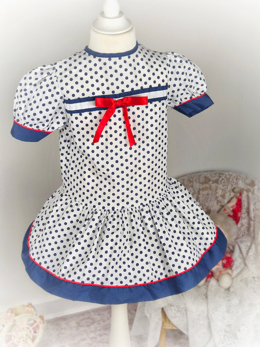 3 years. White vintage dropwaist Roanna dress with navy polka dots a d red ribbon