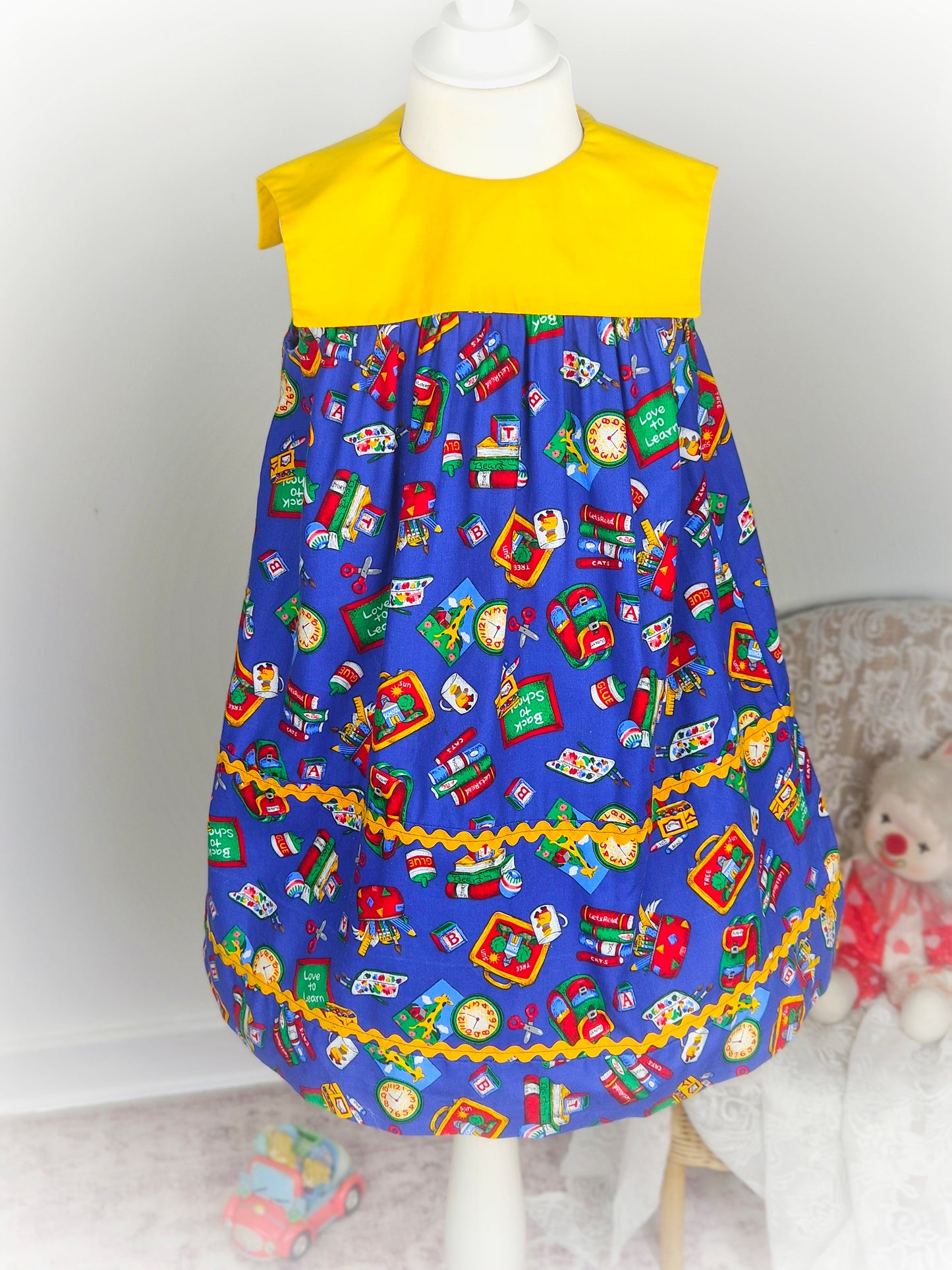 4-5 years. Blue and yellow sleeveless handmade "back to school" dress