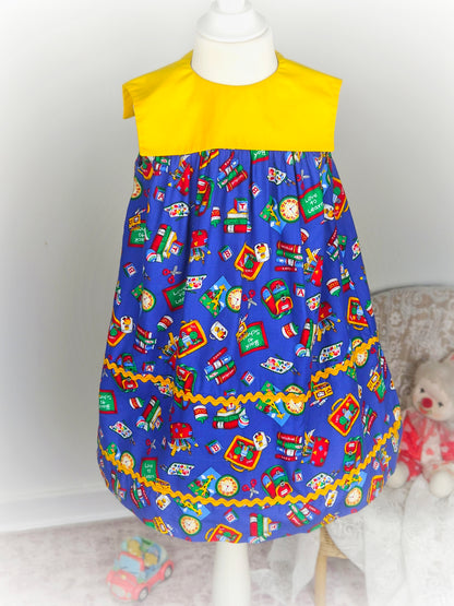 4-5 years. Blue and yellow sleeveless handmade "back to school" dress