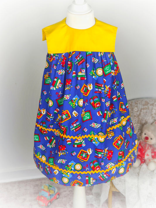 4-5 years. Blue and yellow sleeveless handmade "back to school" dress