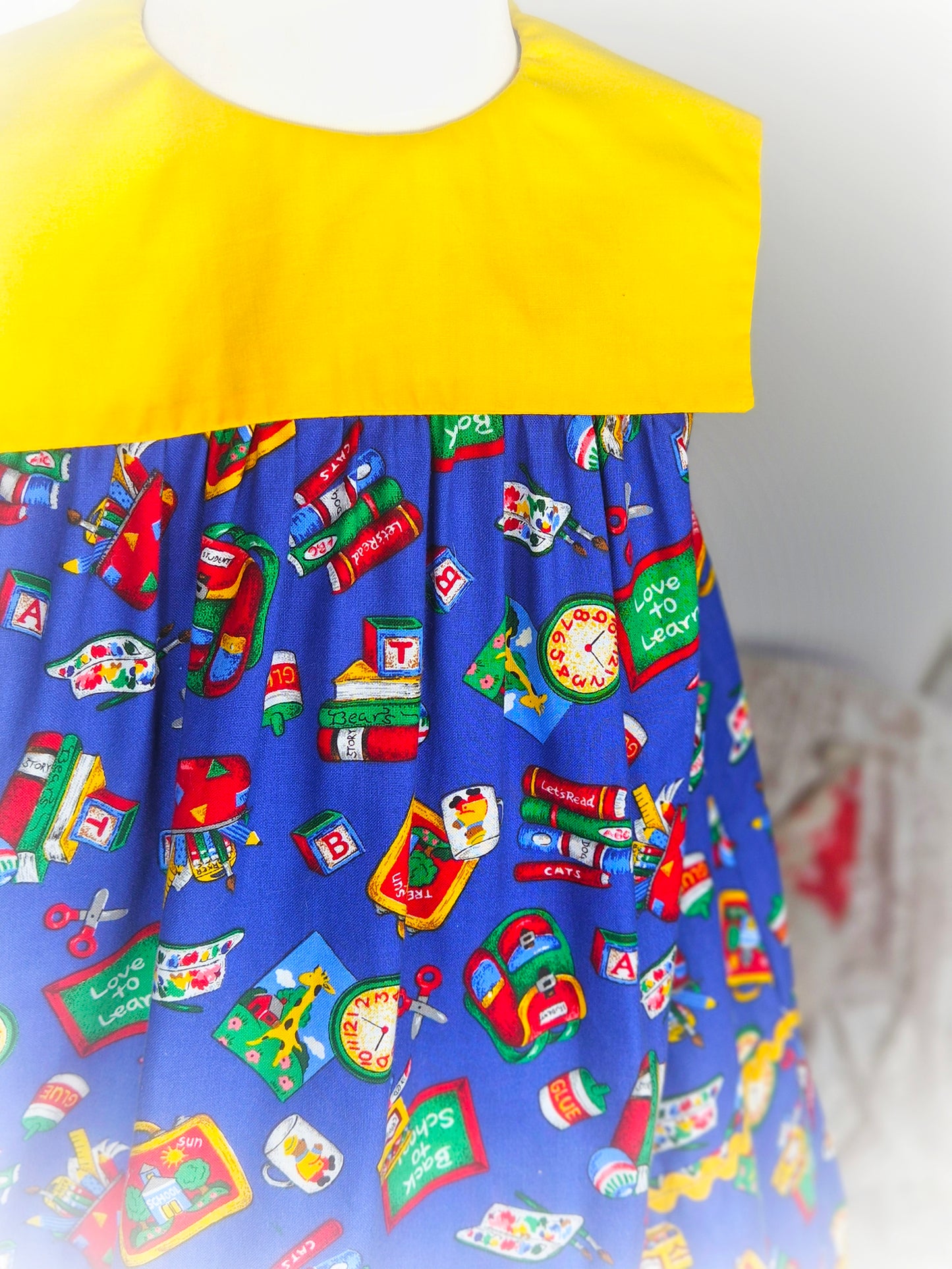 4-5 years. Blue and yellow sleeveless handmade "back to school" dress