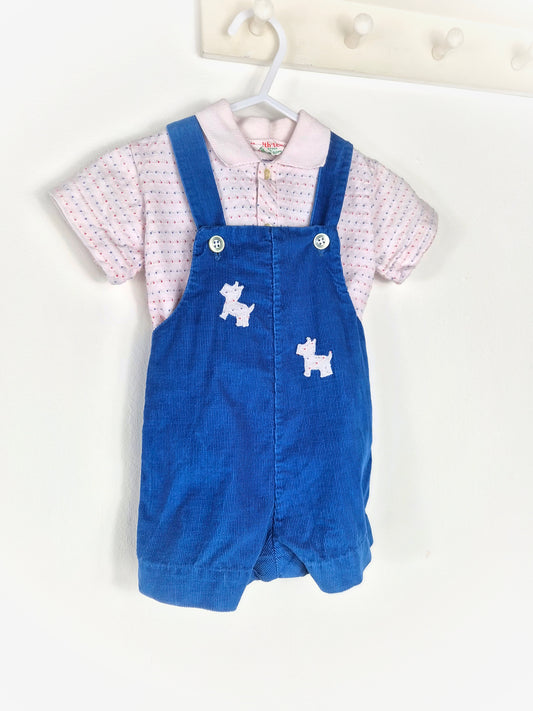9-12 months. Two-piece vintage Healthtex set, white top with red and blue spots and blue corduroy short dungarees with scottie dog appliques